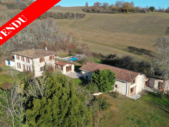 House with swimming pool and large outbuildings